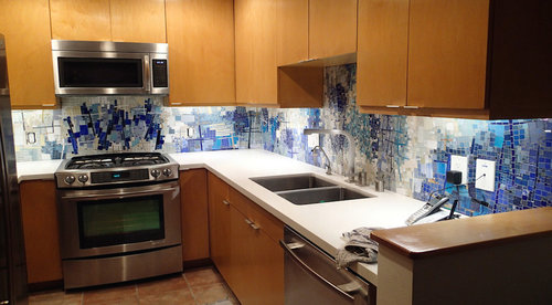 “Jazz Kitchen Backsplash” Mixed Material Mosaic, 14’ length x 21” to 38” highby artist Cynthia Fisher. See her portfolio by visiting www.ArtsyShark.com